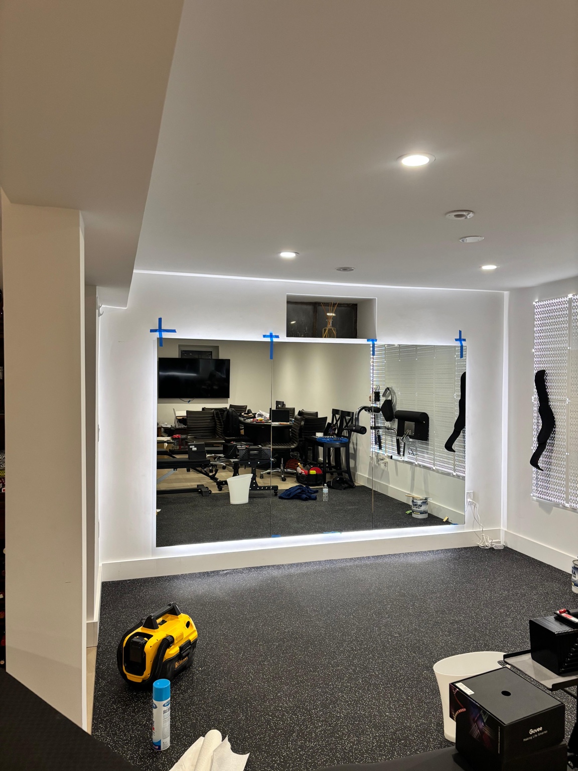 Large custom mirror installation by Horus Glassworks